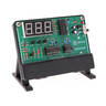 The assembled DayCounter circuit board, with a 3-digit 7-segment display in the upper-left, on a black plastic display stand.